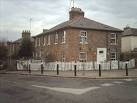 Corner plot. Houses on corner of Coppetts Road and Pages Lane, N10. - via Daymix