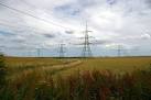 The twin power lines diverge at this point - one heads NE the other ESE. - via Daymix