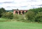 crosses the River Derwent, - via Daymix