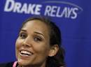 Suh sighting  Lions tackle appears with Lolo Jones at relays
