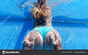 swimming ass girl|Beautiful tanned woman ass in blue swimwear vest near ...