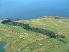 by the late Gene Sarazen and Bruce Devlin) on either side of it. - via Daymix