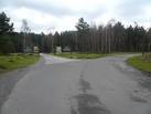 the other signs on the left hand road also advertise outdoor concerts by - via Daymix