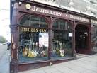 The first thing to go...guitars pawned by their would-be rock star owners in - via Daymix