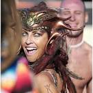 Wendy Doyle, of Los Angeles, smiles as she dances during Burning Man 2006 - Headress_1475633i