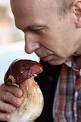 adding wine to fondue chef and