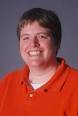 A headshot of Kelly Kirby.