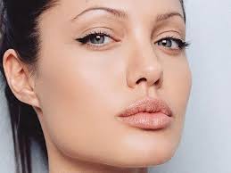 applying eyeliner