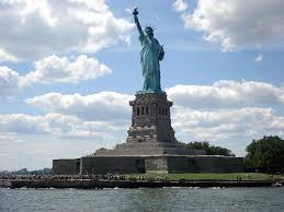 Miss Liberty sits proudly atop