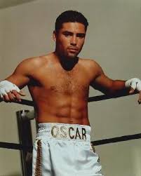 Oscar De La Hoya helps break