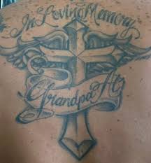 cross and angel wing tattoo