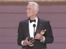 Kirk Douglas receiving an