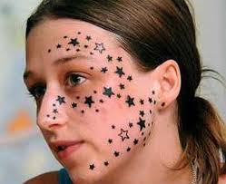 girl face tattoo