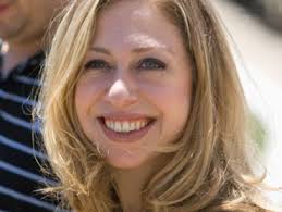 Chelsea Clinton waves as she