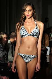 Megan Gale up skirt