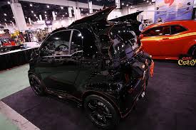 http://t3.gstatic.com/images?q=tbn:qDPLElfsOQgMxM:http://www.odditycentral.com/wp-content/uploads/2010/07/smart_batmobile2.jpg&t=1
