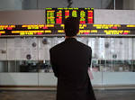 North American markets split as fiscal cliff looms