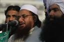 Hafiz Muhammad Saeed, center, the leader of a banned Islamic group Jamaat-ud - 4ad36159e9ad7c5f9fa5c050c7ea-grande