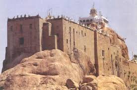 The stoen Rock Fort Temple at Tiruchirapalli is the most famous land mark of this busy ... - rockfort_temple_trichi