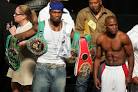 Photos - Rapper 50 Cent holds up FLOYD MAYWEATHER Jr. belts at the ...
