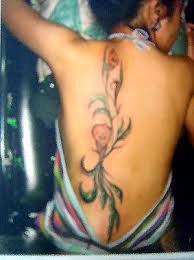 art flower tattoo on the upper