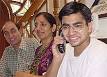 Brijesh Takkar (extreme right) attends to telephone calls as his parents ... - id6