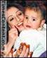 Madhurima, wife of singer Sonu Nigam with son Nirvaan, during the launch of ... - Madhurima-Nirvaan-album-launch
