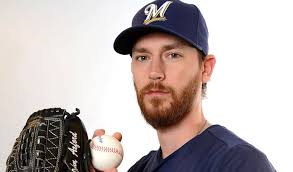 Milwaukee Brewers&#39; John Axford throws during the third inning of an exhibition spring training baseball game against the Oakland Athletics Saturday, Feb. - R68fnid
