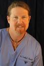 About Dr. Tim Bennett - Tim_Bennett_Chiropractor_in_scrubs