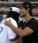 Taylor Lautner and Lil Jon indulge their bromance at baseball game