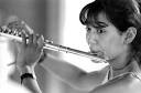 Bianca Garcia, 14, of Salem, N.H., tunes up at the Boston University ... - flute