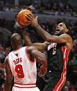 Late Bulls charge sinks Heat as Bosh struggles