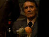 There is an orange in front of Don Emilio Barzini during the mafia family ... - f_oranges_g1_06