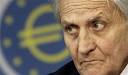 photo: AP / Martin Oeser. President of the European Central Bank Jean-Claude Trichet looks on during a news conference