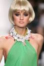 Worn by celebrity model Caroline D'Amore, "The Peroni dress" was made of ... - peroni-pict-close-up