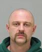 Michael Dubois Jr., an East Kentwood High School teacher, was arrested ...