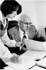 Bob Myers at work as Executive Director of the National Commission on Social Security Reform, early 1982. Shown with him is Annette Coates of the Commission ... - myers19
