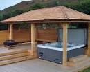 Outdoor entertainment area with hot tub - Coastline Decking