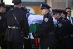Mourners Gather for Slain New York Policeman