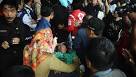 AirAsia Victim Families in Shock, Anger as Mourning Begin - Bloomberg