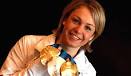 Magdalena Neuner konnte beim Empfang in München drei Medaillen präsentieren - magdalena-neuner-medaillen-514