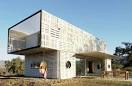 Modern Manifesto House Made From Wood Pallets and Shipping ...