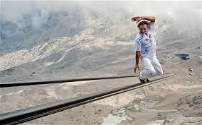 High wire artist Freddy Nock balances as he walks up on the rope of a Zugspitze cable car Photo: AP. 8:26PM BST 20 Aug 2011 - tightRope_1976853c