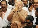Modi arrives in Mumbai to unveil 2014 agenda