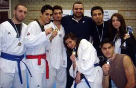 From left (standing): Yazan Abdel Al, Melhem Akouri, Ayman Safa, Coach Mark Rjeily, Ahmad Khatib and Victoria ... - taekwondo-fsul2010-03-big