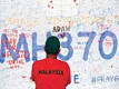 China urges Malaysia to continue MH370 search | Business Standard News