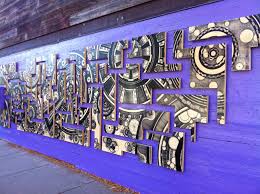 Art on the wall of violet hour @ derek.broox.com