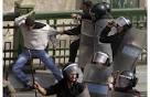 Photos: Police fire rubber bullets at crowd in escalating Egypt ...
