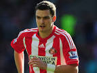Sunderlands ADAM JOHNSON says fans will soon see him back to his.