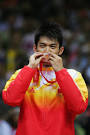 Photos: Lin Dan of China wins Badminton Men's Singles gold - The ...